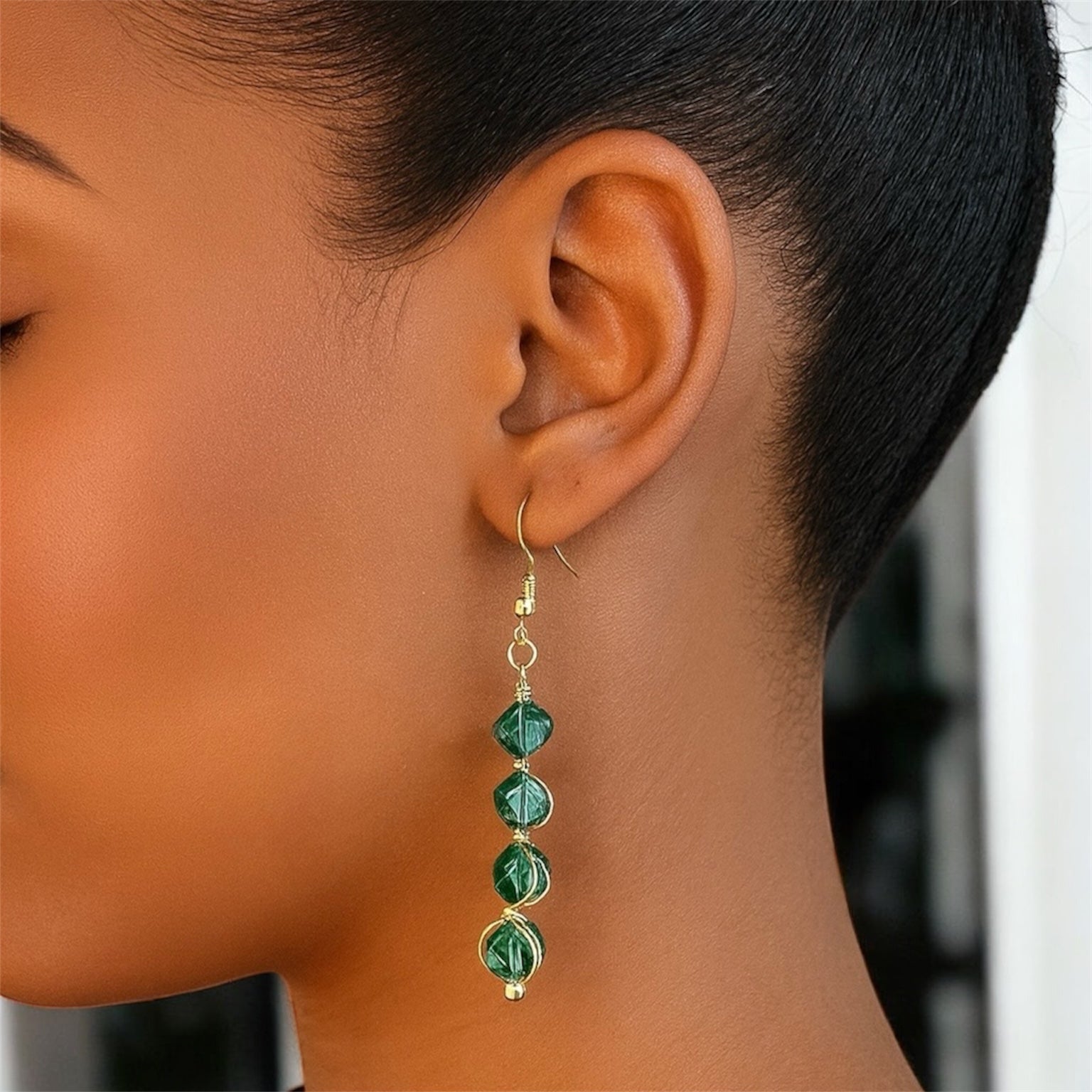 Emerald Twist Drop Earrings