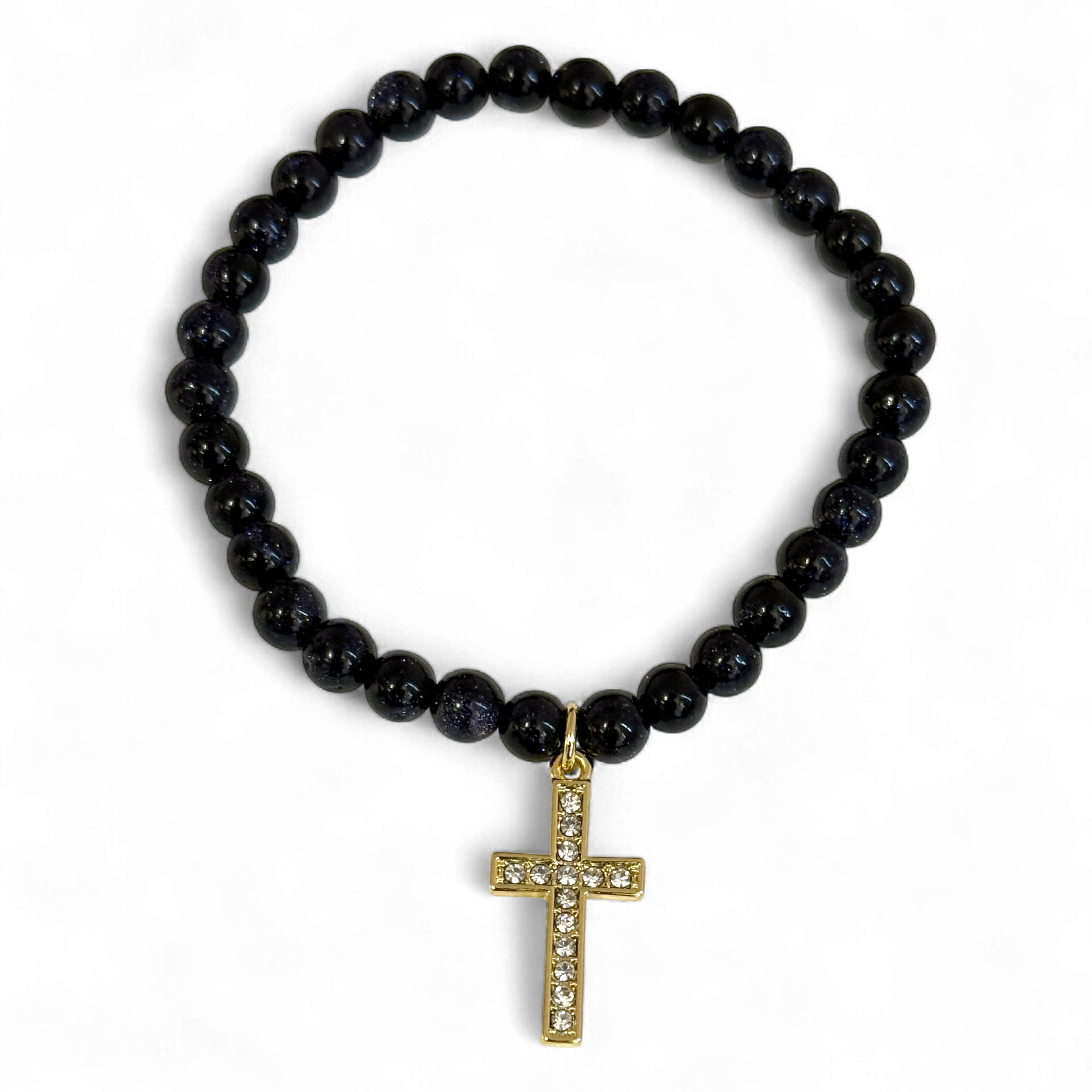 Black beaded bracelet with a gold cross pendant on a white background