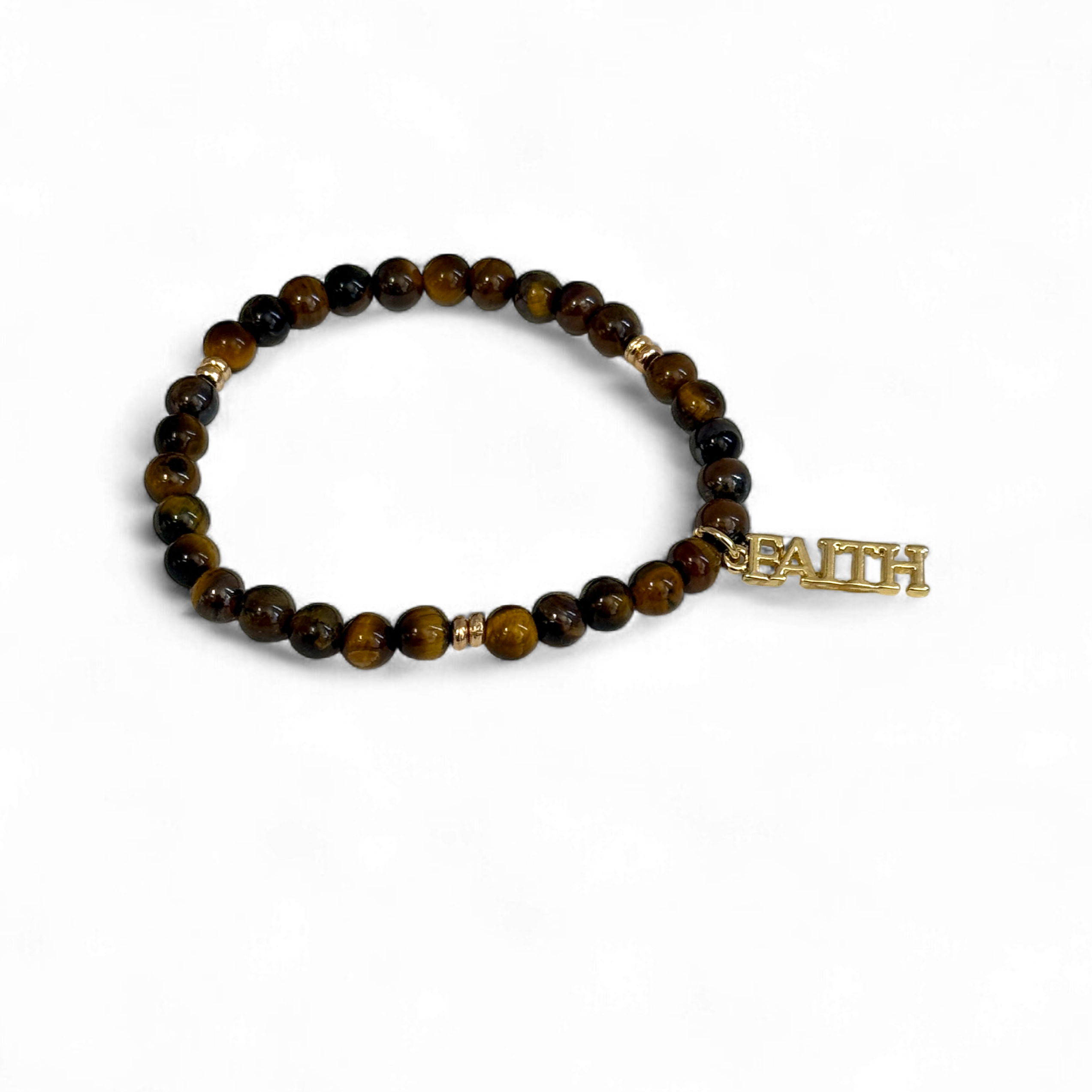 Bracelet with brown beads and a gold tag on a white background