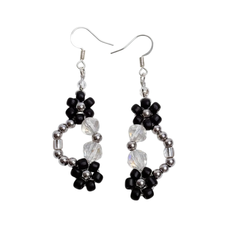 Pair of beaded earrings on a white background