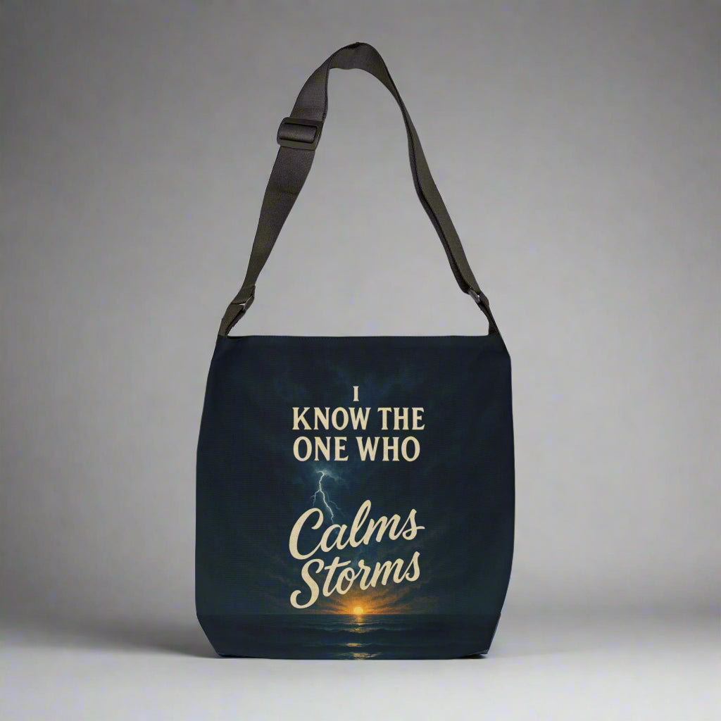 Black bag with a scenic design and text on a white background