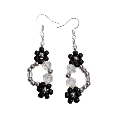 Pair of beaded earrings on a white background