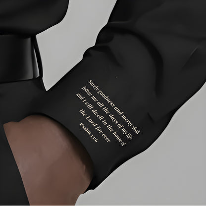 Black sleeve with white text on a gray background