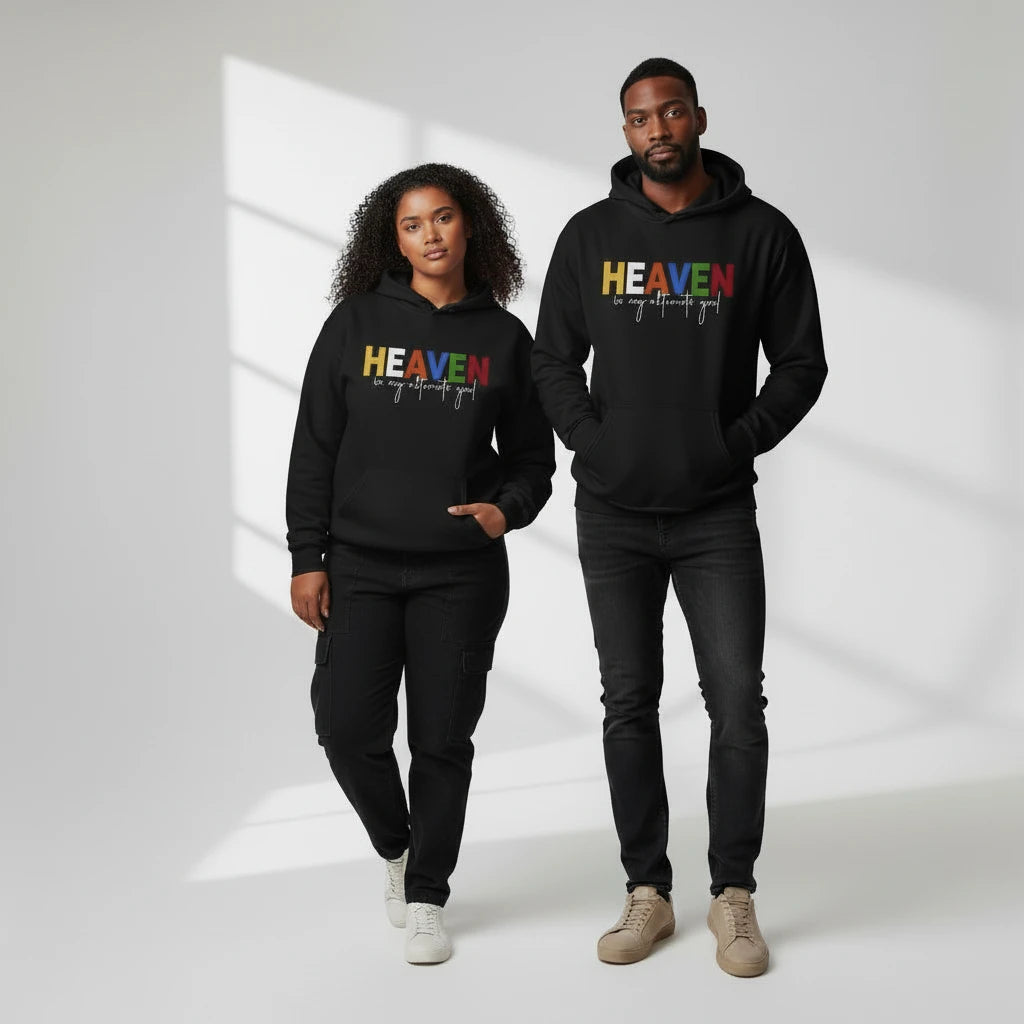Two people wearing black hoodies with colorful text on a white background