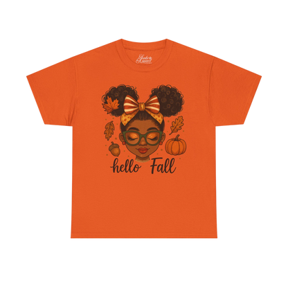 Orange t-shirt with a graphic of a girl with a bow, leaves, and pumpkins with 'hello Fall' text on a white background.
