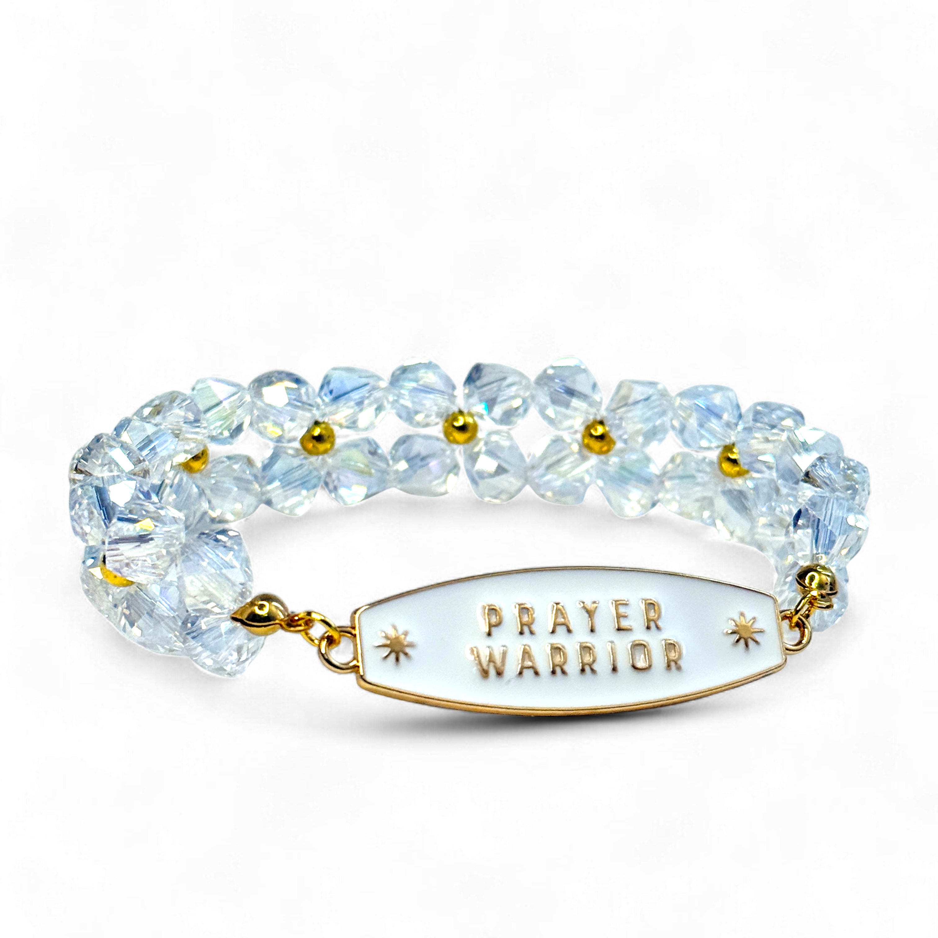Bracelet with clear stones and gold accents on a white background