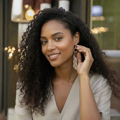 Woman wearing earrings with a blurred background
